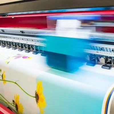 Printer printing an image of yellow flowers